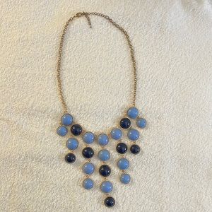 Navy and light blue gold toned necklace.